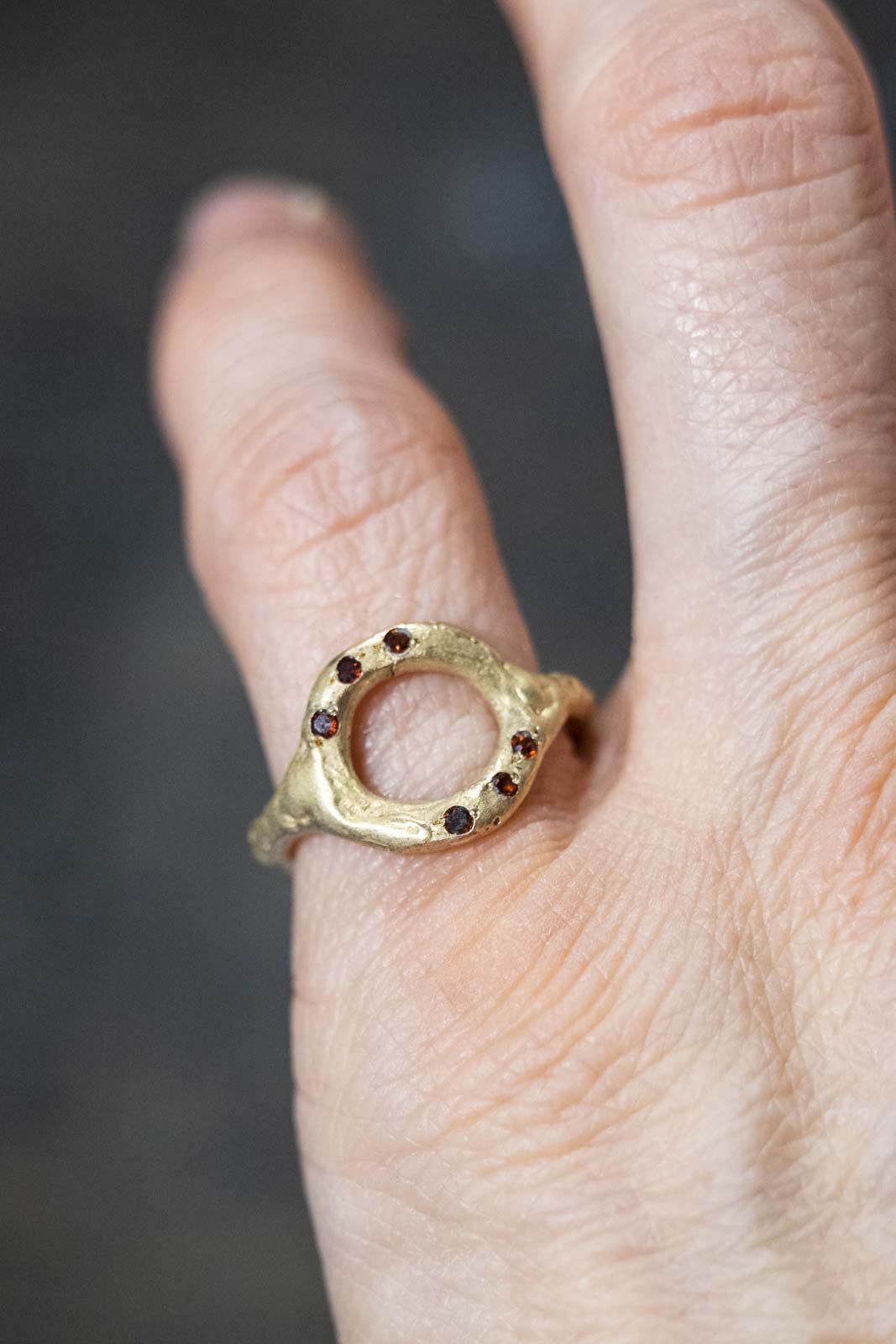 BRONZE RING WITH GARNET